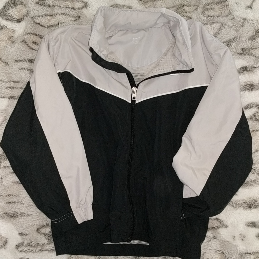 Black and grey Nike windbreaker
